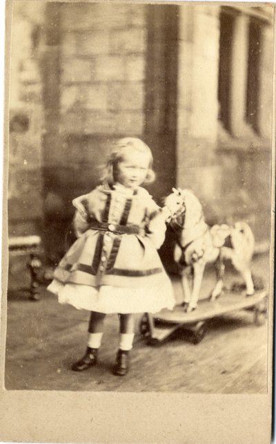 Young Girl with Her Pull-Along Toy Horse, 1860s by English Photographer